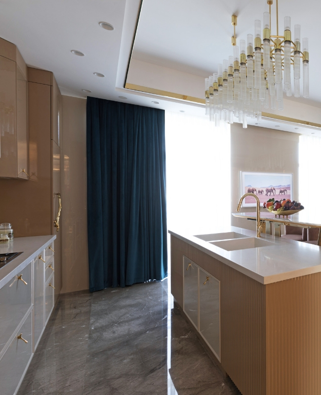 A Luxury Kitchen Where Gold and Coral Create a Stunning Environment